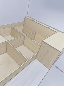 Contemporary low-profile tatami platform bed with integrated desk and storage drawers by the window.