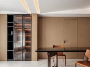 living room storage side cabinet with modern plywood doors.Flat pack furniture made from plywood, neatly assembled in a modern living room.