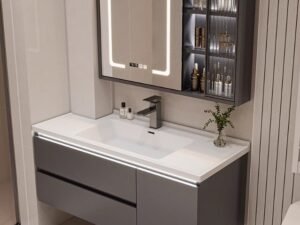 Elegant bathroom vanity with storage drawers and cabinet by.A modern hotel bathroom featuring a floating plywood vanity with backlit mirror.