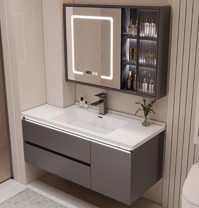 Elegant bathroom vanity with storage drawers and cabinet by.A modern hotel bathroom featuring a floating plywood vanity with backlit mirror.