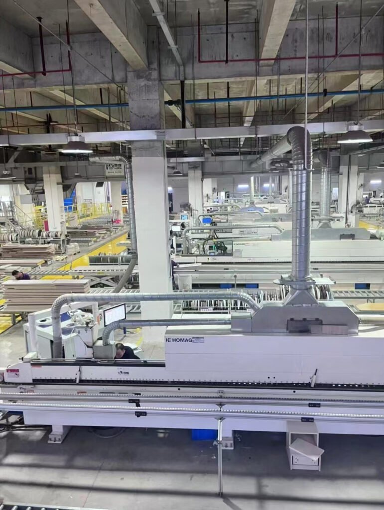 CNC precision cutting machine processing OSB board for custom furniture manufacturing