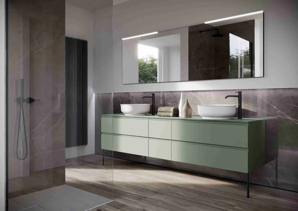 Double vanity sinks for bathrooms with a shared tall cabinet in a suite