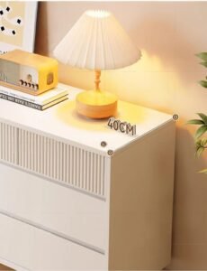 stylish modern chest of drawers in high-gloss white finish with metal handles