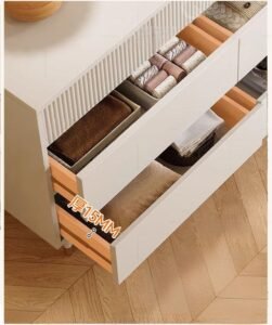 high-gloss white dresser with four drawers for organized storage