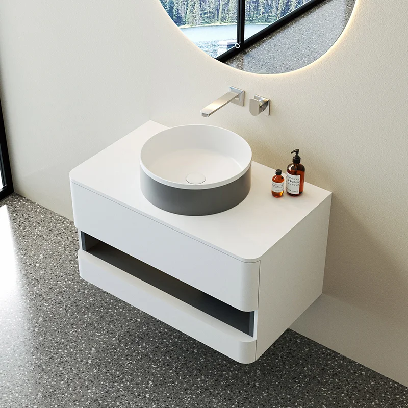 Corner vanities for bathrooms combined with a tall cabinet in a small guest bathroom