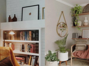 Modern open bookcase and book shelving display in a bright living room styled with books and decor