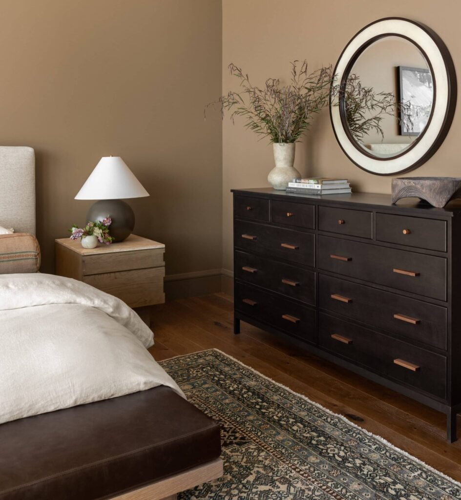 beige nightstand and black modern nightstand with colorful nightstands in a bedroom