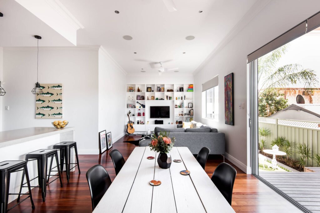 modern dining room furniture set in a small open-plan living and kitchen space