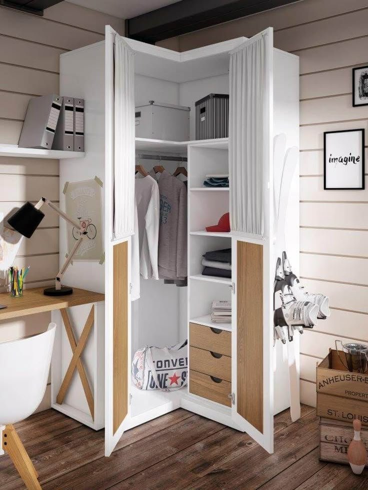 A hero shot of a modern small bedroom with a corner or narrow wardrobe.