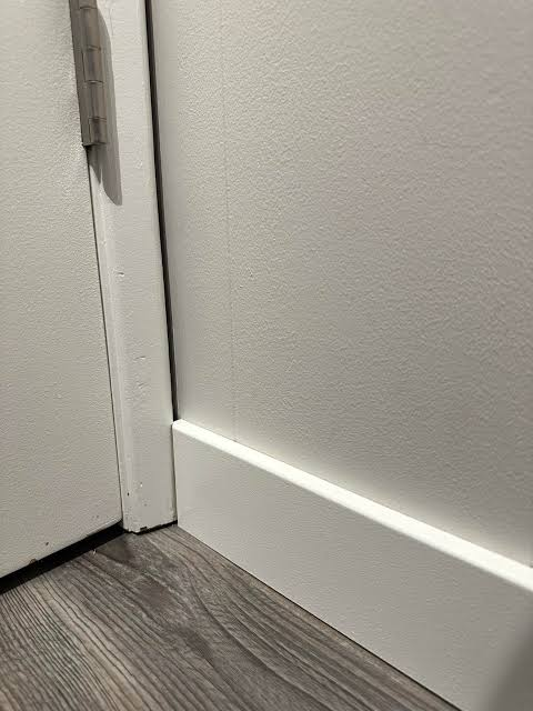 common hotel furniture installation issues skirting uneven walls door casing interference HVAC return