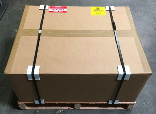 Quality inspection checklist with carton corner protection and labeled pallets for export shipping.