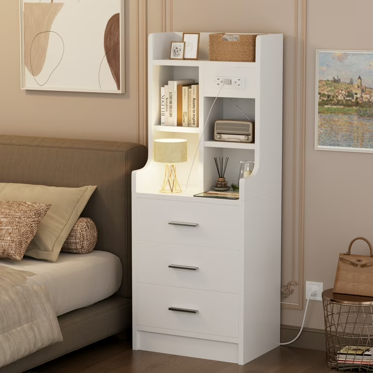 Modern bedside cabinets with drawers in a hotel-style bedroom showing slim and wide nightstand storage options