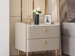 Modern bedside cabinets with drawers in a hotel-style bedroom showing slim and wide nightstand storage options