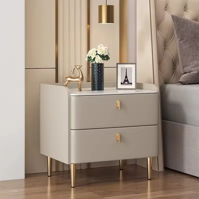 Modern bedside cabinets with drawers in a hotel-style bedroom showing slim and wide nightstand storage options