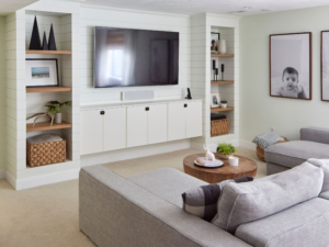 Modern plywood TV stand with soft-close doors and adjustable oak shelves.