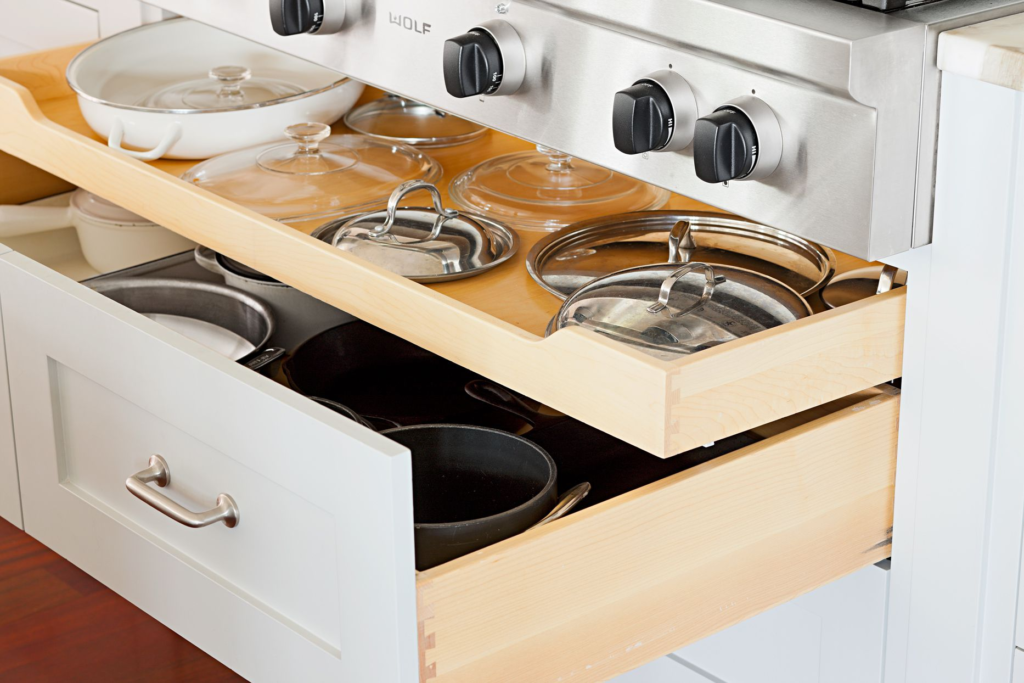 drawer organizers and pull-out baskets for space-saving kitchen furniture