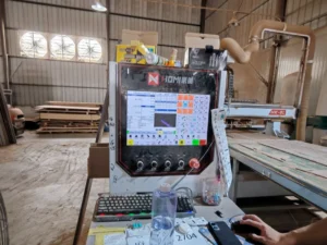 CNC cutting equipment processing panels for a custom flat-pack cabinet order