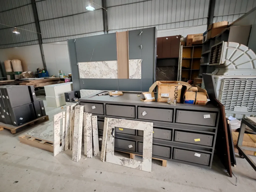 Custom cabinetry components staged for pre-shipment inspection before export to North America