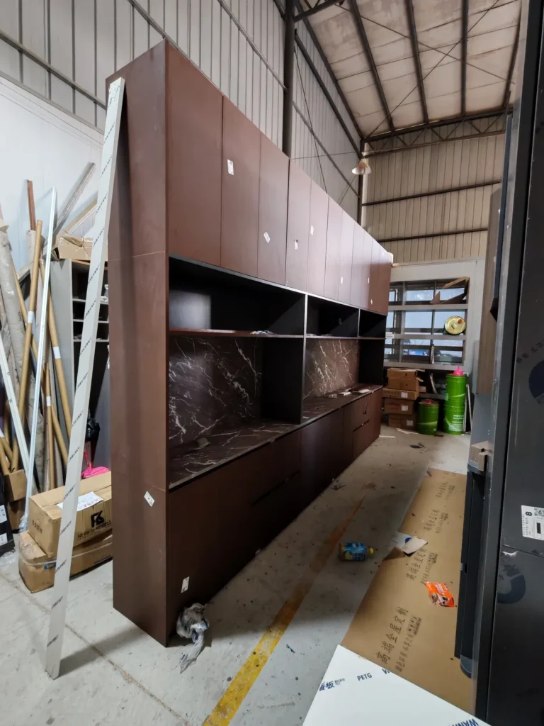 Factory trial assembly of custom cabinetry for a North American project before export