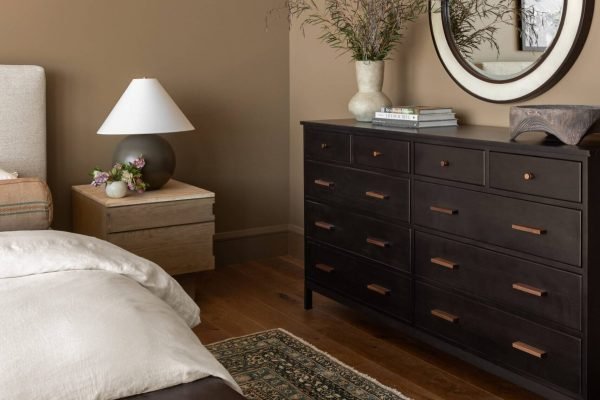 beige nightstand and black modern nightstand with colorful nightstands in a bedroom