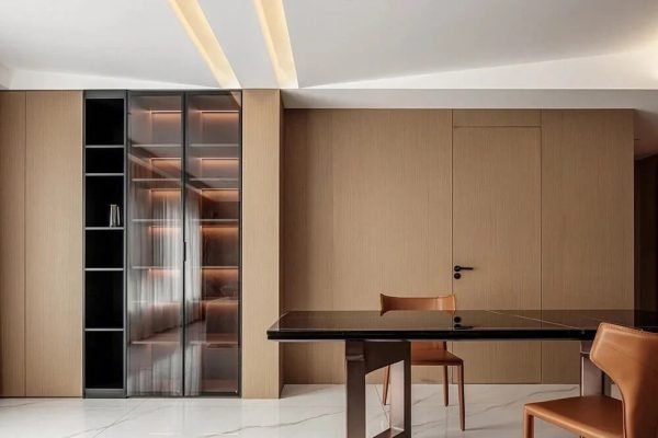 living room storage side cabinet with modern plywood doors.Flat pack furniture made from plywood, neatly assembled in a modern living room.