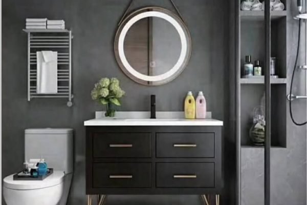 Over the toilet storage cabinet in a modern white bathroom.A modern, wall-mounted white bathroom storage cabinet with a large mirror on the front. The cabinet is installed above a bathroom vanity, providing ample space for organizing toiletries and towels. The door is open, revealing two adjustable interior shelves, showcasing the practical storage solution for a contemporary bathroom.