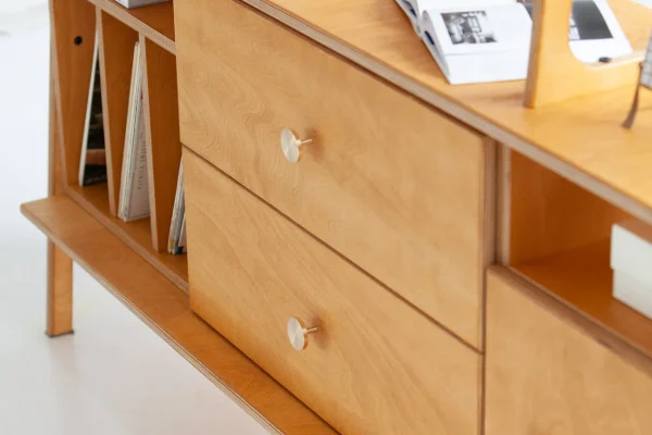 Scandinavian-style plywood furniture with light tones and clean lines.