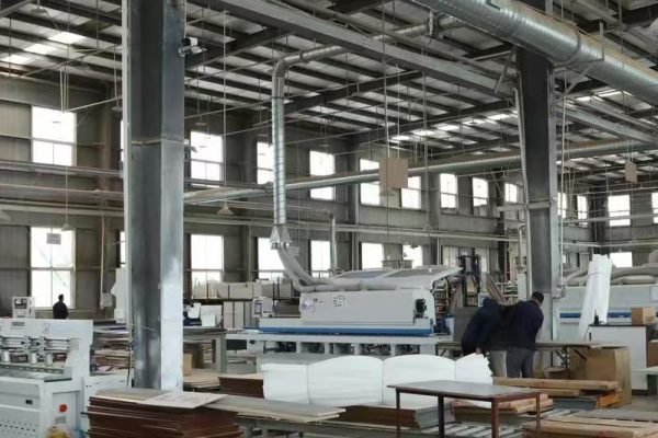 Panel material storage warehouse with organized stacks of plywood, OSB, MDF and particle board